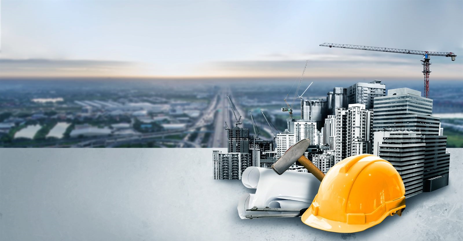 Construction engineers reviewing building plans