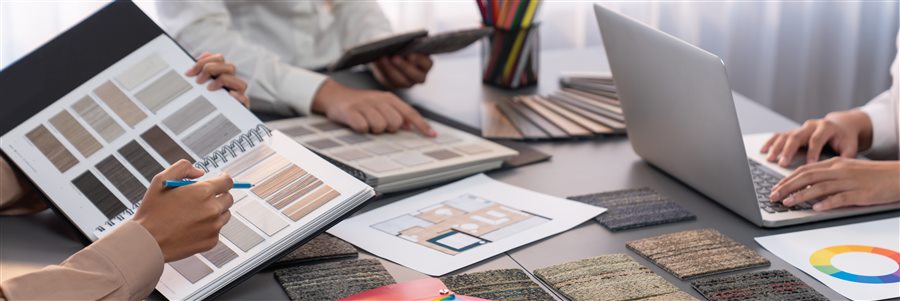 Property planning consultation with materials and floor plan